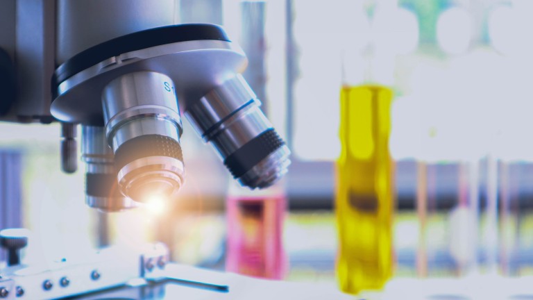 Image of microscope and test tubes 