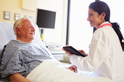 Hospital patient with caring doctor