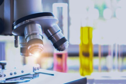 Image of microscope and test tubes 